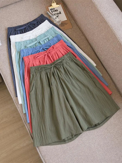 Pantalones cortos de algodón para mujer, informales, de verano, con dos bolsillos, de cintura alta, holgados, suaves y frescos.