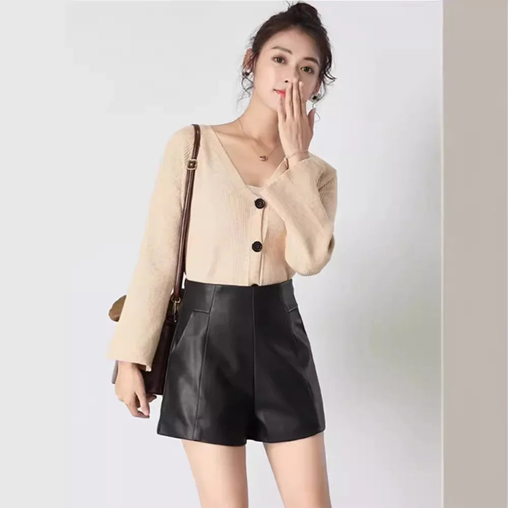 Pantalones cortos de cuero negro adelgazantes de cintura alta para mujer, novedad de otoño de 2023, pantalones vaqueros holgados de corte A y pierna ancha con corte recto.