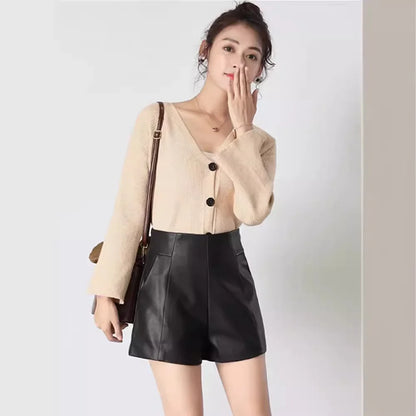 Pantalones cortos de cuero negro adelgazantes de cintura alta para mujer, novedad de otoño de 2023, pantalones vaqueros holgados de corte A y pierna ancha con corte recto.