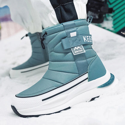 Botas de nieve de invierno para mujer, de terciopelo grueso, de viaje, cálidas, antideslizantes, de algodón, de tubo medio, informales y cómodas.