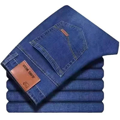 Pantalones vaqueros holgados de pierna recta, elásticos, resistentes al desgaste y versátiles para trabajo y construcción.