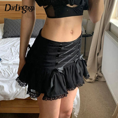 Minifalda Darlingaga gótica Y2K con ribete de encaje, estilo Harajuku, vintage, con lazo, estilo academia oscura, sexy, estilo grunge, estilo acampanado