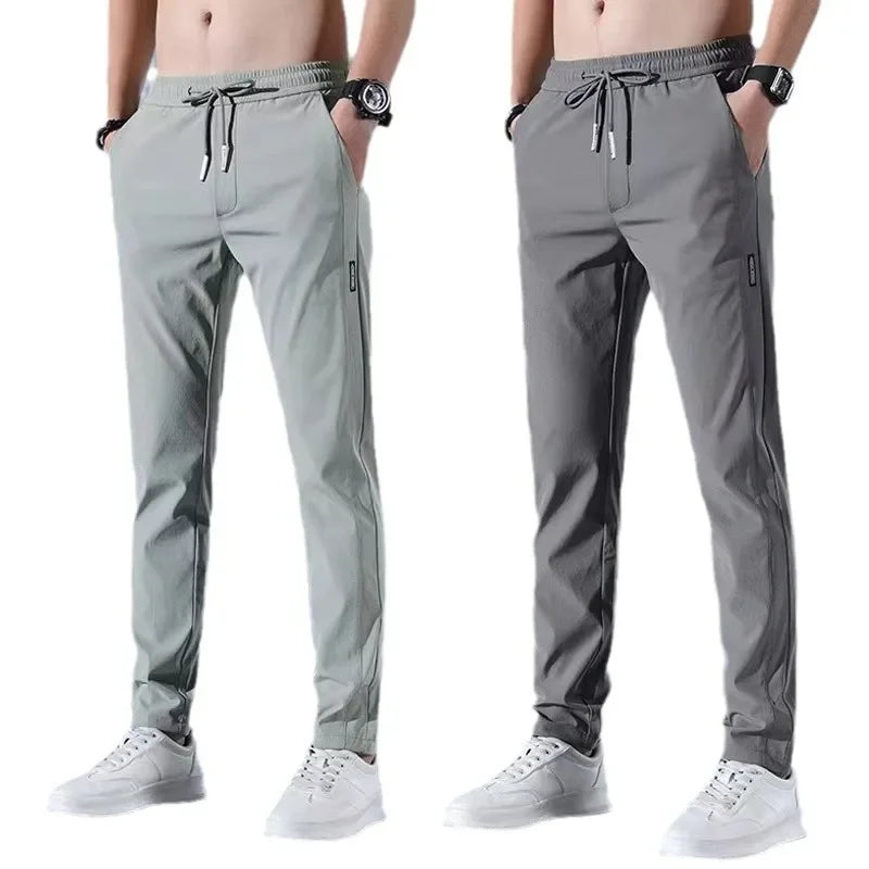Pantalones deportivos largos de seda de hielo para hombre, de verano, nuevos, finos, informales, de negocios, elásticos, transpirables, de pierna recta, de talla grande