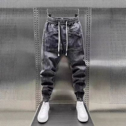 Pantalones vaqueros holgados de talla grande para hombre, informales, de moda, para otoño e invierno, con puños, estilo coreano, versátiles, duraderos, cómodos y ajustados.
