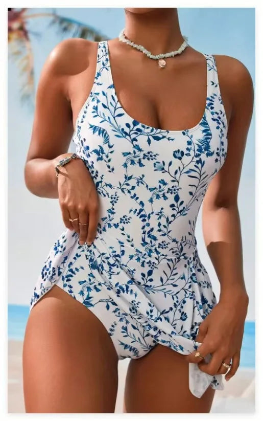 Traje de baño de una pieza con falda para mujer, novedad de 2025, traje de baño sexy con estampado floral para playa.