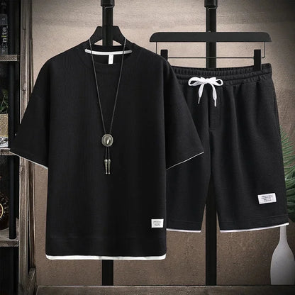 Conjunto deportivo informal de verano para hombre, pantalones cortos de manga corta con cordón, pantalones holgados de cinco cuartos, traje fino de dos piezas para hombre