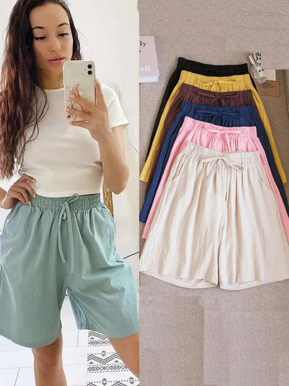 Pantalones cortos de algodón para mujer, informales, de verano, con dos bolsillos, de cintura alta, holgados, suaves y frescos.