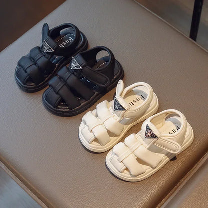 Sandalias para niños, novedad de verano 2024, moda para niños y niñas, color sólido, con cierre de velcro, antideslizantes, suela suave, decoración metálica versátil.