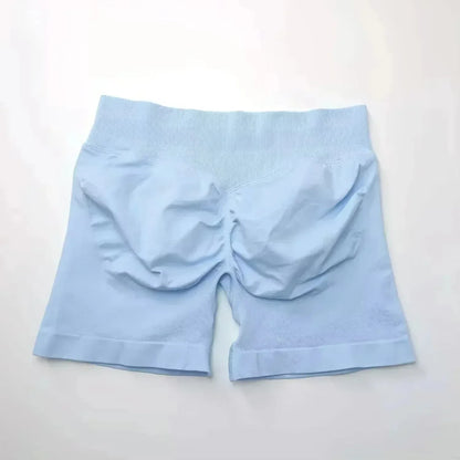 Pantalones cortos deportivos de yoga para mujer, de verano, con efecto piel de melocotón, con bolsillo en la cadera, cintura alta, levantamiento de cadera, secado rápido.
