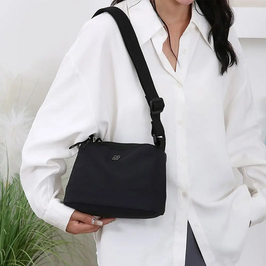 Bolso de hombro de nailon suave y moderno para mujer, de color liso, estilo informal, con múltiples bolsillos, bolso de mano para estudiante.