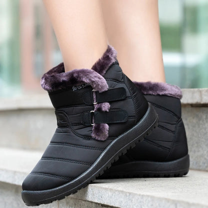 Botas de nieve cálidas de piel para mujer, botines de tobillo de talla grande, informales, planos, de invierno, antideslizantes, a la moda, impermeables