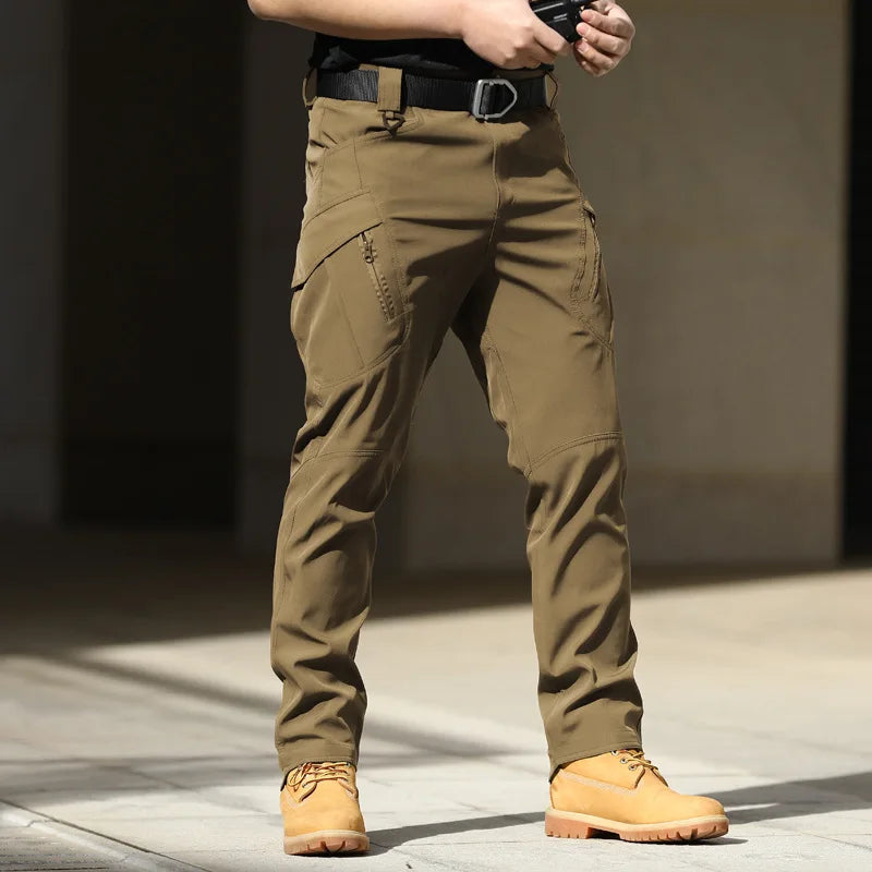 Pantalones tácticos militares urbanos para hombre, estilo cargo, con múltiples bolsillos, impermeables, resistentes al desgaste, ideales para entrenamiento informal.