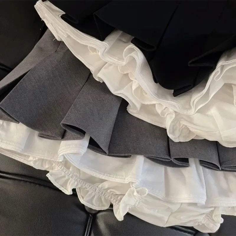 Minifalda negra con volantes Mooyufon para mujer, estilo coreano, con diseño de patchwork, plisada, estilo japonés kawaii, de cintura alta, combina con todo, estilo línea A, nueva