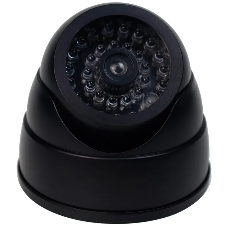 Cámara de seguridad domo falsa con luz LED roja, funciona con pilas y no requiere cableado. Ideal para interiores y exteriores.