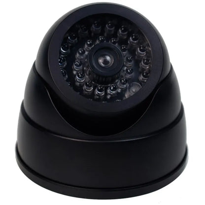 Cámara de seguridad domo falsa con luz LED roja, funciona con pilas y no requiere cableado. Ideal para interiores y exteriores.
