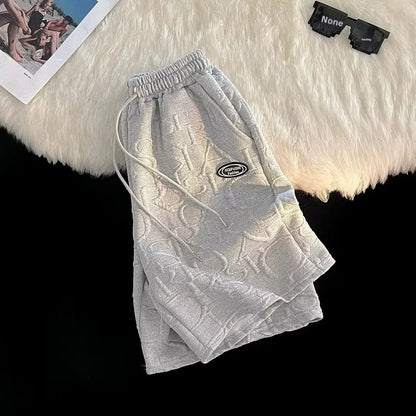 Conjunto de camiseta y pantalones cortos de manga corta para hombre, ropa deportiva informal de verano, corte holgado, marca de moda, largo de cinco cuartos, cómodo