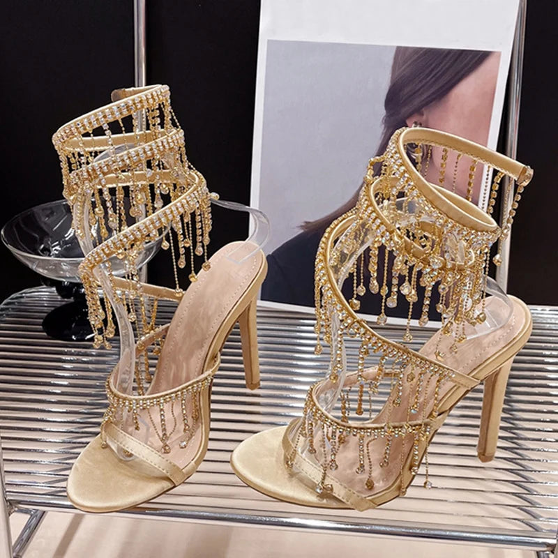Liyke - Elegantes zapatos de boda para mujer, con borlas de cristal, sandalias de tacón de aguja con punta abierta y tacones de stripper dorados