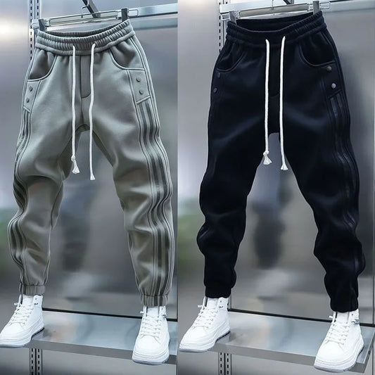 Pantalones casuales de primavera 2025 para hombre, modernos, con cintura elástica y banda, pantalones deportivos versátiles y de moda.