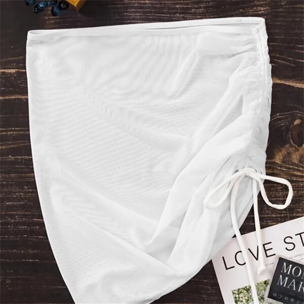 Traje de baño sexy translúcido, falda de playa, falda de gasa para vacaciones en la playa, falda con volantes, falda de malla con cordón ajustable, ropa de playa sólida, falda a la cadera
