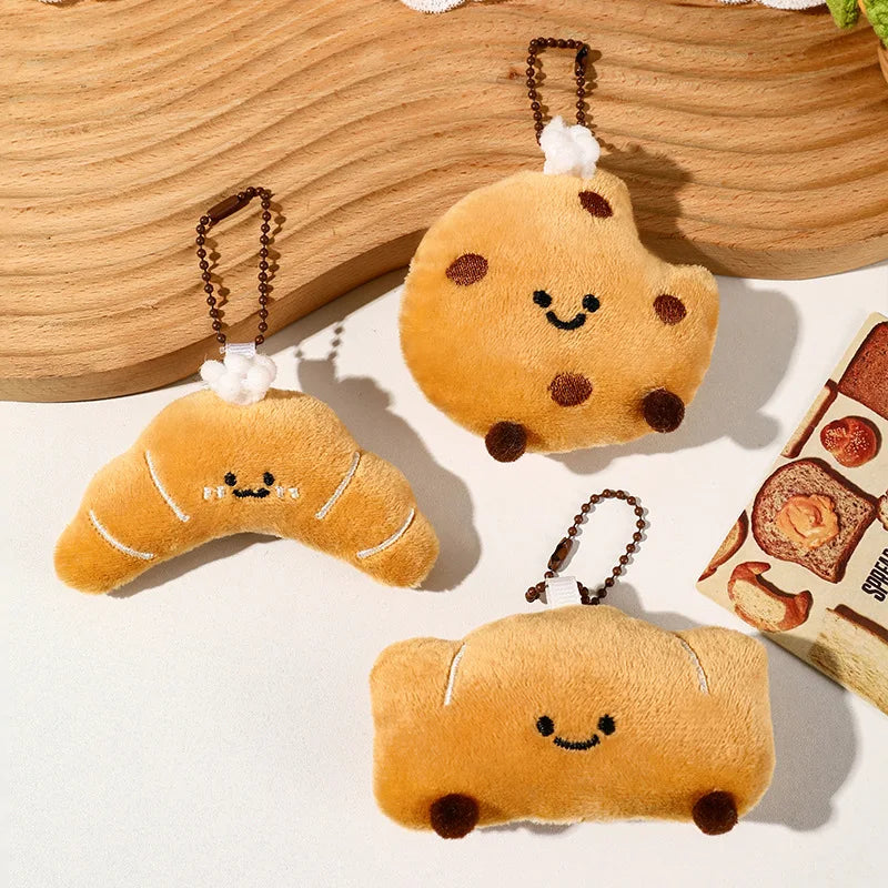Panes lindos, bolsas de peluche, colgantes, llaveros, accesorios creativos para muñecas pequeñas, mochilas de dibujos animados para niñas al por mayor.