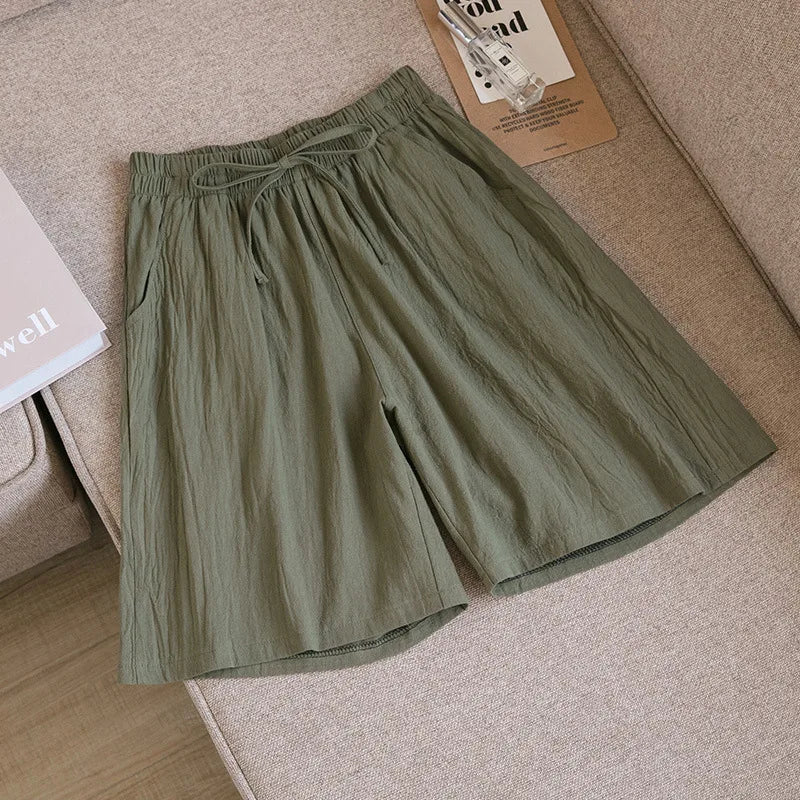 Pantalones cortos de algodón para mujer, informales, de verano, con dos bolsillos, de cintura alta, holgados, suaves y frescos.