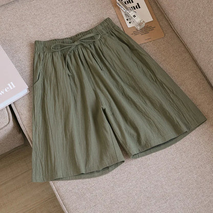 Pantalones cortos de algodón para mujer, informales, de verano, con dos bolsillos, de cintura alta, holgados, suaves y frescos.