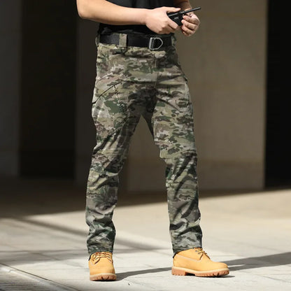 Pantalones tácticos militares urbanos para hombre, estilo cargo, con múltiples bolsillos, impermeables, resistentes al desgaste, ideales para entrenamiento informal.