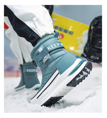 Botas de nieve de invierno para mujer, de terciopelo grueso, de viaje, cálidas, antideslizantes, de algodón, de tubo medio, informales y cómodas.