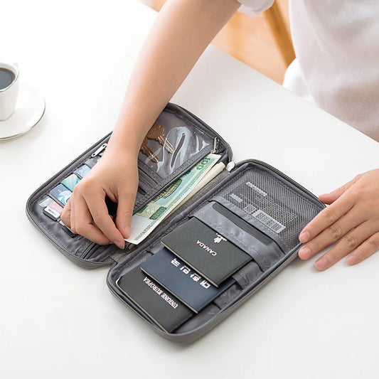 Organizador de documentos de viaje: porta pasaporte impermeable con bloqueo RFID, ranuras para múltiples tarjetas y bolsillo con cremallera para avión/tren.