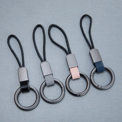 Llaveros de cuero genuino para hombres y mujeres, llavero de coche con cordón de algodón, llavero de metal, regalo, llavero moderno.