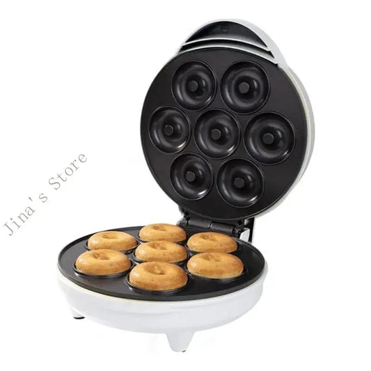 Mini máquina para hacer donas de 1000 W con superficie antiadherente. Prepara 7 donas pequeñas. Ideal para postres infantiles.