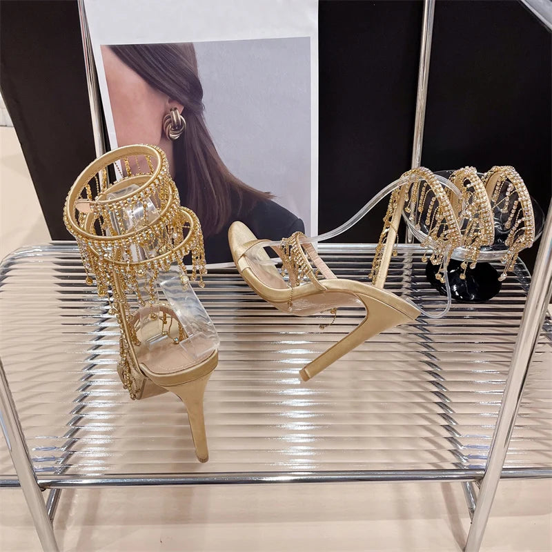 Liyke - Elegantes zapatos de boda para mujer, con borlas de cristal, sandalias de tacón de aguja con punta abierta y tacones de stripper dorados