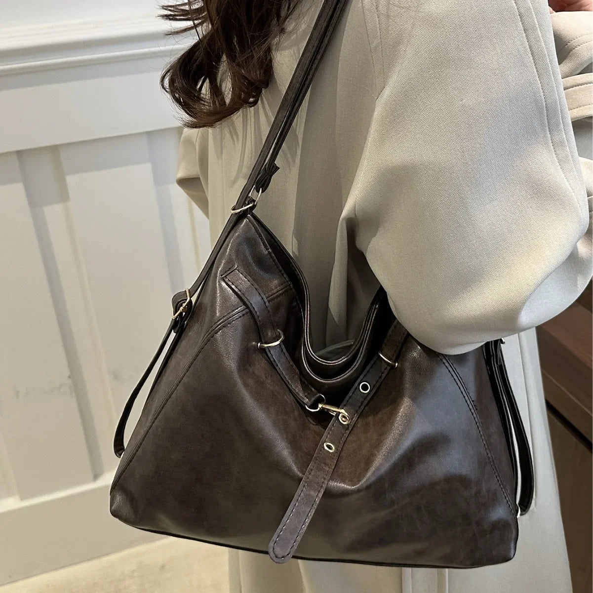 Bolso de mano retro de gran capacidad para mujer, mochila informal de moda con doble hombro para otoño e invierno, nuevo bolso de moda.