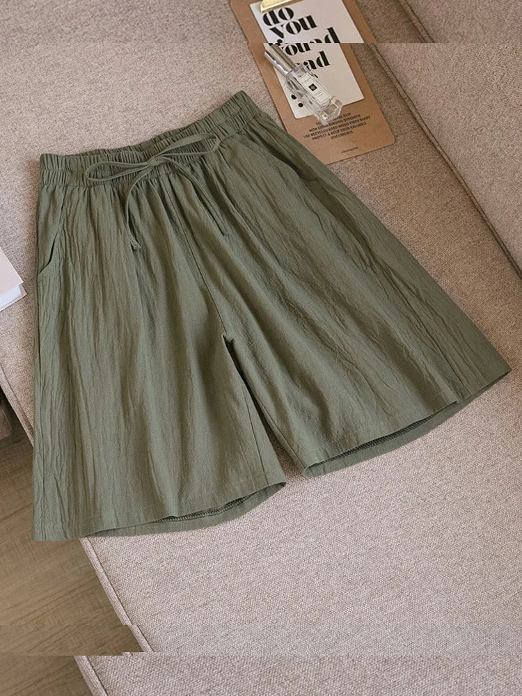 Pantalones cortos de algodón para mujer, informales, de verano, con dos bolsillos, de cintura alta, holgados, suaves y frescos.
