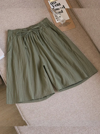 Pantalones cortos de algodón para mujer, informales, de verano, con dos bolsillos, de cintura alta, holgados, suaves y frescos.