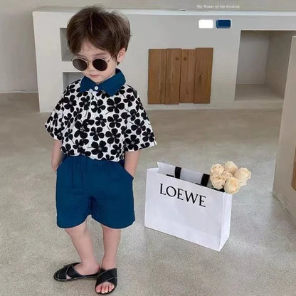 Ropa para niños 2025, nuevo traje de flores de moda para bebé, camisa de manga corta, pantalones cortos, elegante conjunto de dos piezas de pantalones cortos casuales retro.