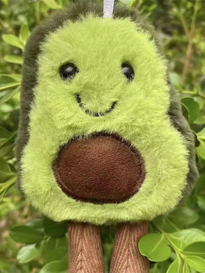 Un lindo juguete de peluche de aguacate para mascotas, adecuado para la compañía diaria de perros pequeños y medianos.