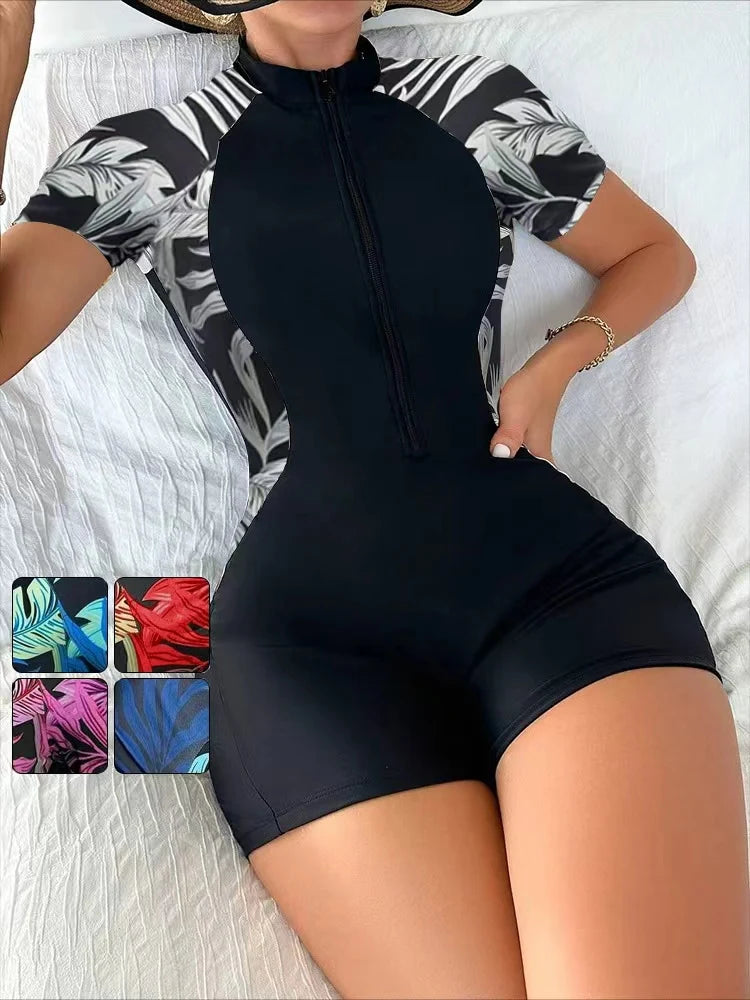 Traje de baño enterizo floral para mujer, manga corta, cierre frontal, estampado tropical, ideal para surfear, con protección solar (sin sujetador incorporado).