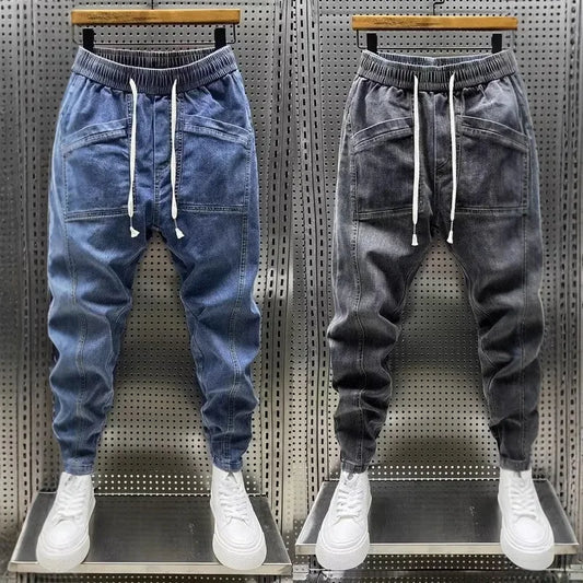Pantalones vaqueros holgados de talla grande para hombre, informales, de moda, para otoño e invierno, con puños, estilo coreano, versátiles, duraderos, cómodos y ajustados.