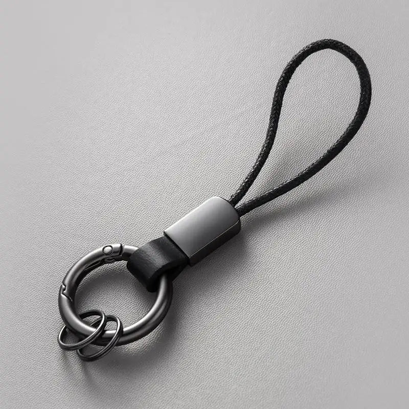 Llaveros de cuero genuino para hombres y mujeres, llavero de coche con cordón de algodón, llavero de metal, regalo, llavero moderno.
