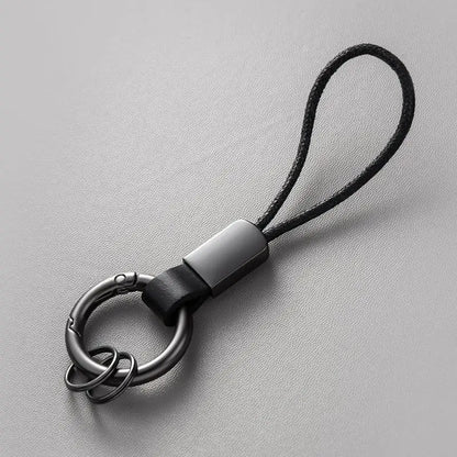 Llaveros de cuero genuino para hombres y mujeres, llavero de coche con cordón de algodón, llavero de metal, regalo, llavero moderno.