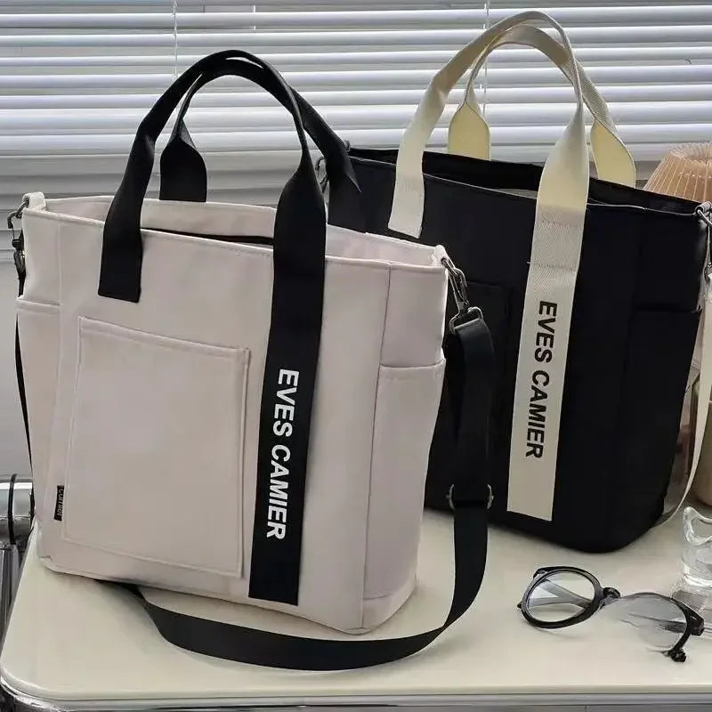 Nuevo bolso de hombro informal de gran capacidad, de nailon, impermeable, de lona, sencillo y moderno, para colegiala.