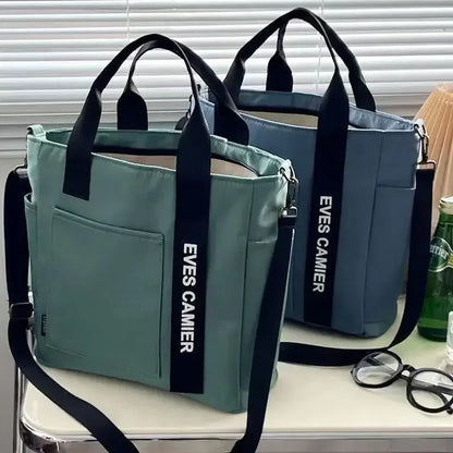 Nuevo bolso de hombro informal de gran capacidad, de nailon, impermeable, de lona, sencillo y moderno, para colegiala.