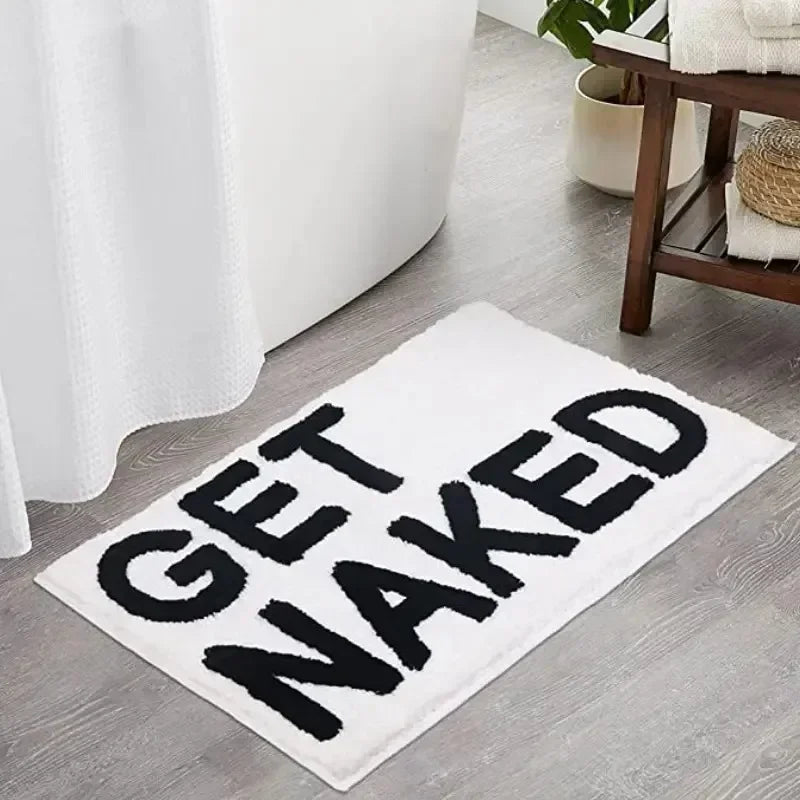 Consigue una alfombra de baño, una bonita alfombra para la bañera o una alfombra de baño para decorar apartamentos, una alfombra de ducha con mechones grises y blancos.