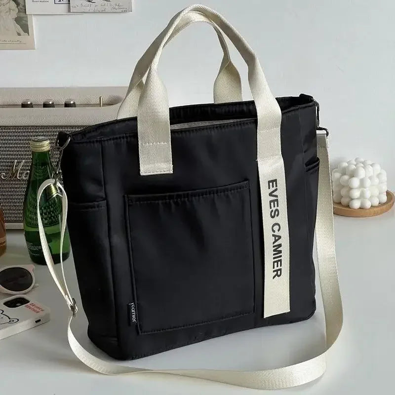Nuevo bolso de hombro informal de gran capacidad, de nailon, impermeable, de lona, sencillo y moderno, para colegiala.