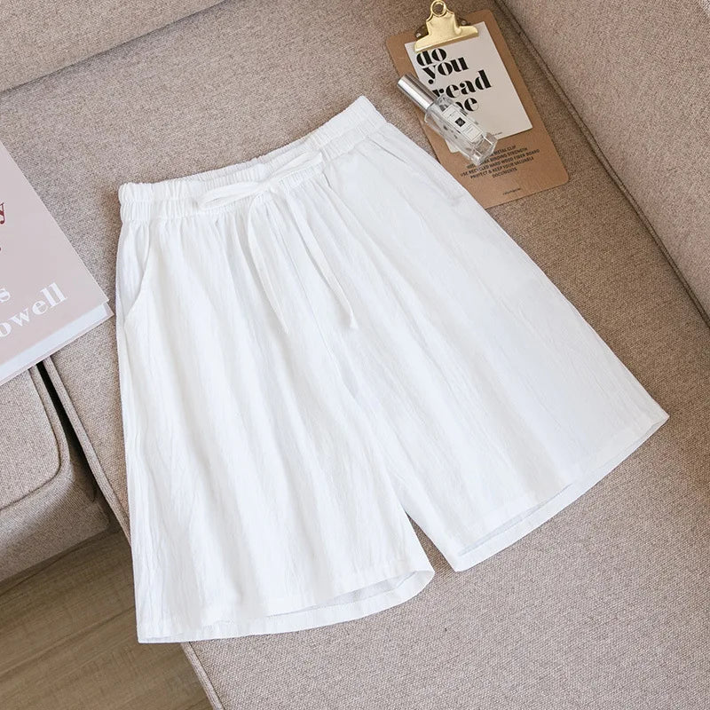 Pantalones cortos de algodón para mujer, informales, de verano, con dos bolsillos, de cintura alta, holgados, suaves y frescos.