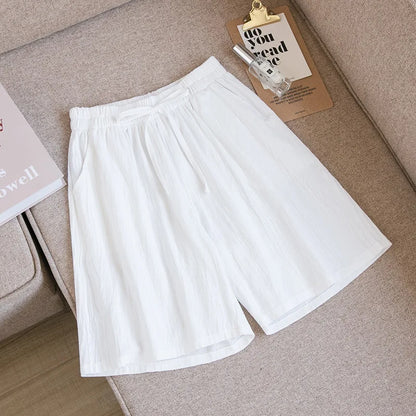 Pantalones cortos de algodón para mujer, informales, de verano, con dos bolsillos, de cintura alta, holgados, suaves y frescos.