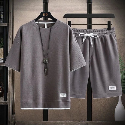 Conjunto deportivo informal de verano para hombre, pantalones cortos de manga corta con cordón, pantalones holgados de cinco cuartos, traje fino de dos piezas para hombre
