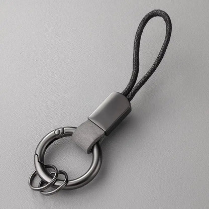 Llaveros de cuero genuino para hombres y mujeres, llavero de coche con cordón de algodón, llavero de metal, regalo, llavero moderno.