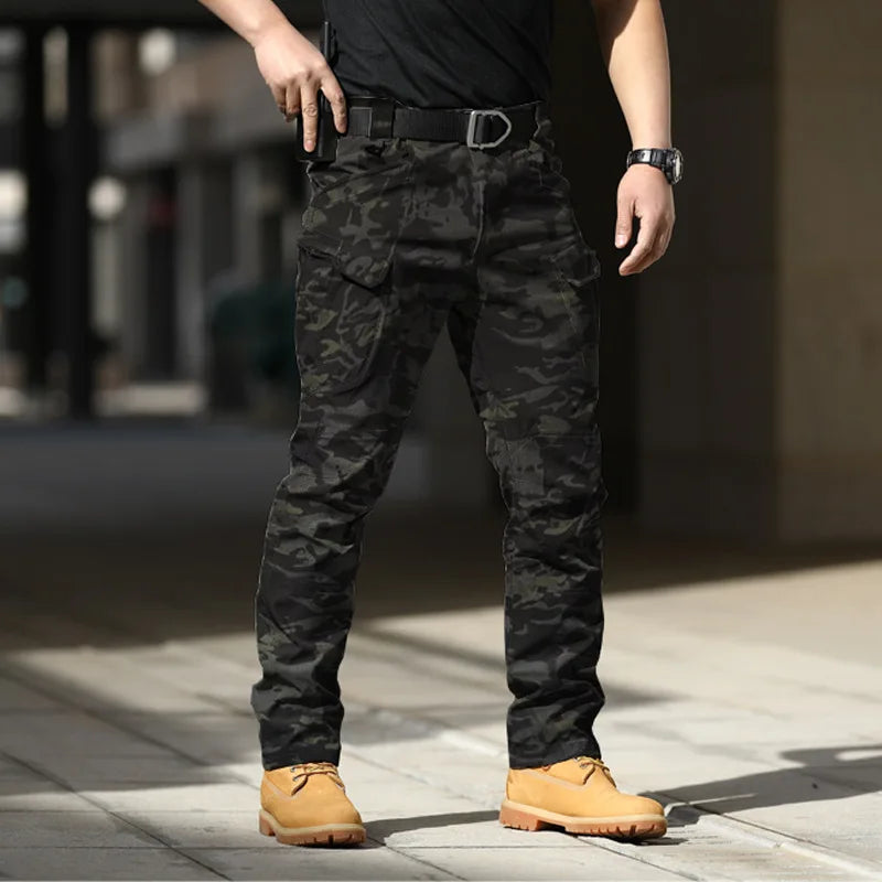 Pantalones tácticos militares urbanos para hombre, estilo cargo, con múltiples bolsillos, impermeables, resistentes al desgaste, ideales para entrenamiento informal.